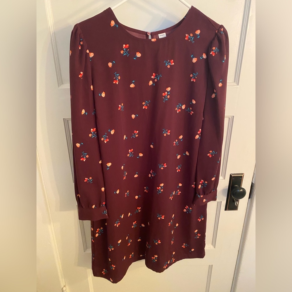 Maroon long sleeve dress with pink rose print. Fits just above or at the knee.